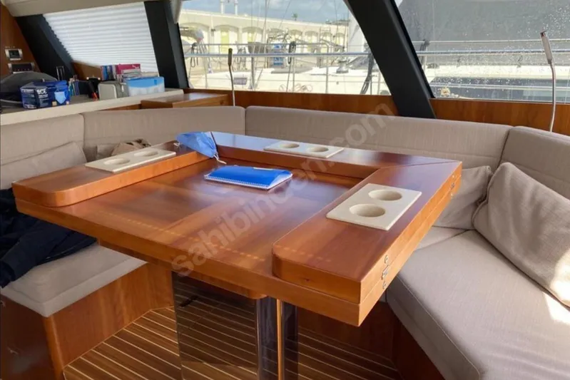 Moody Ds 54 Yacht Photos Pics Luxurious Moody DS 54 yacht interior with wooden table and cushioned seating, 2019 model.
