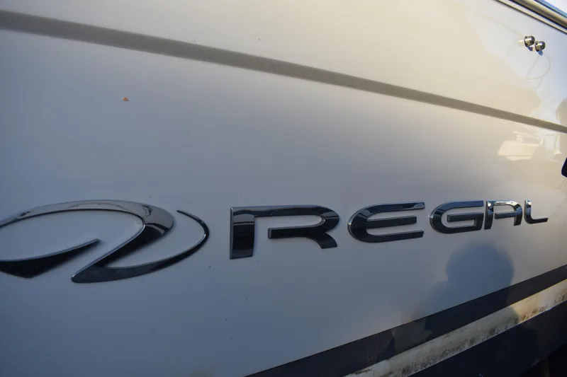  Yacht Photos Pics 2025 Regal 38 FXO boat logo on white hull.