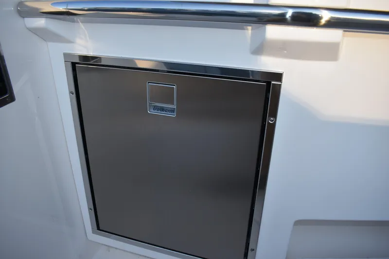  Yacht Photos Pics Stainless steel door on 2025 Regal 38 FXO boat, featuring sleek design and modern finish.