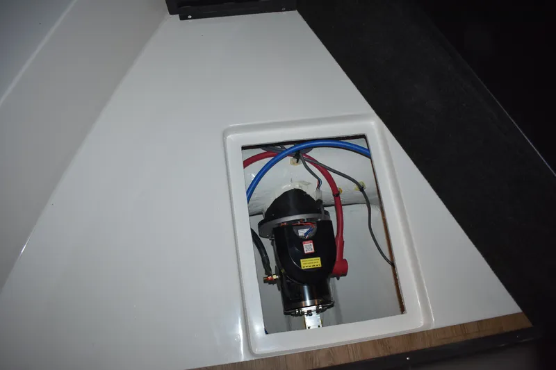  Yacht Photos Pics 2025 Regal 38 FXO boat interior compartment with visible wiring and components.