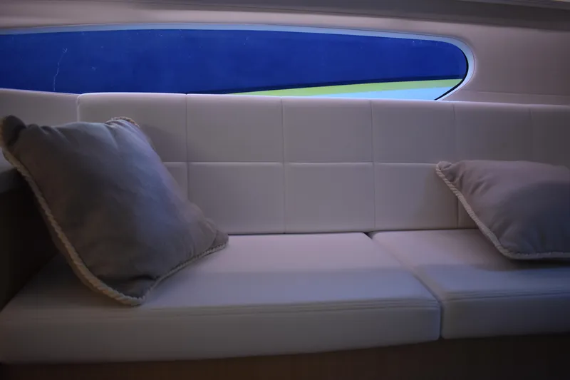  Yacht Photos Pics Luxurious interior seating of 2025 Regal 38 FXO yacht with plush cushions.