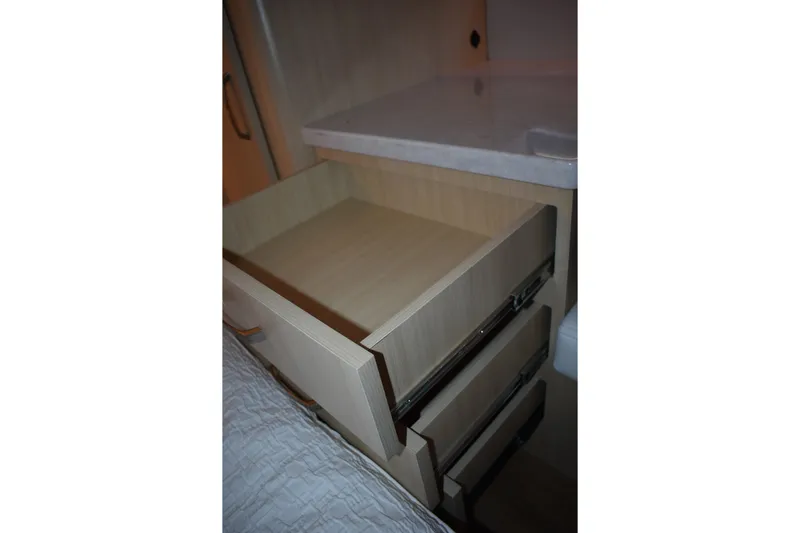  Yacht Photos Pics Open wooden drawer in 2025 Regal 38 FXO boat interior.