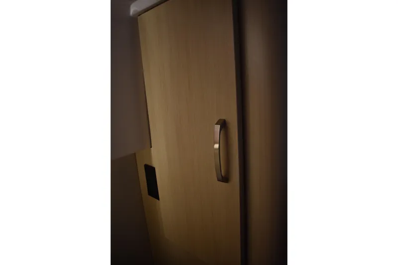  Yacht Photos Pics Wooden cabinet door with sleek handle on 2025 Regal 38 FXO boat.