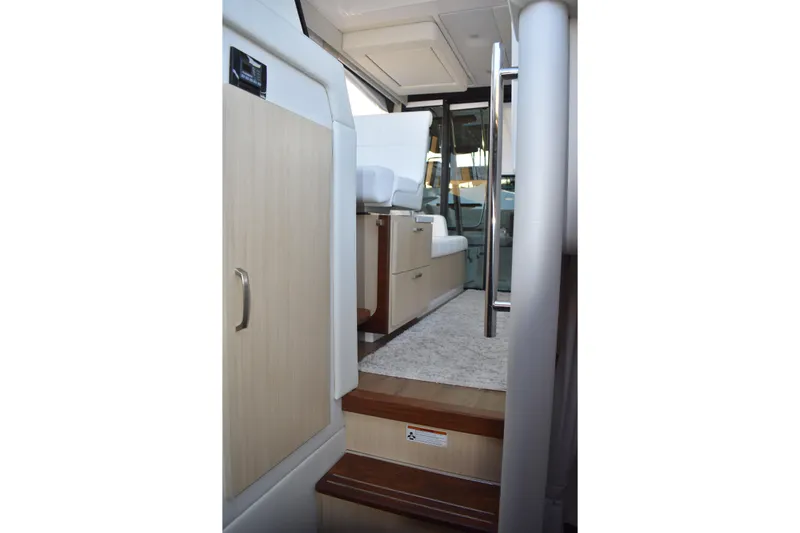  Yacht Photos Pics Interior view of 2025 Regal 38 FXO yacht, featuring modern design and comfortable seating.