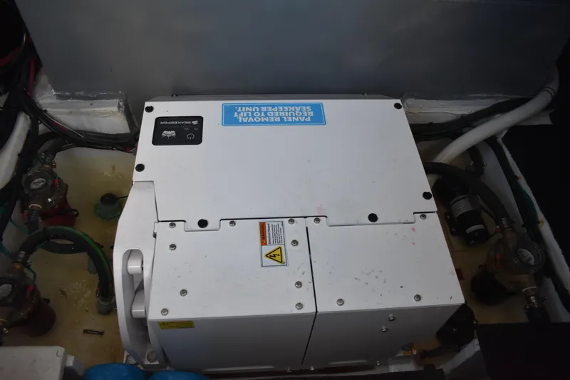  Yacht Photos Pics Engine compartment of 2025 Regal 38 FXO boat with Seakeeper stabilization unit.