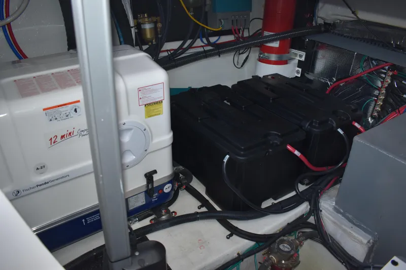  Yacht Photos Pics Engine room of 2025 Regal 38 FXO with Fischer Panda generator and battery setup.