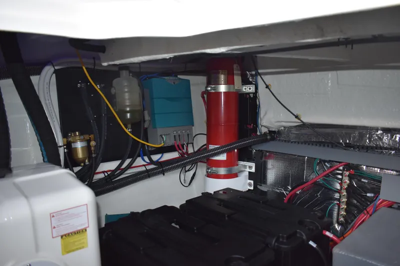  Yacht Photos Pics Engine compartment of 2025 Regal 38 FXO boat, showcasing wiring and components.