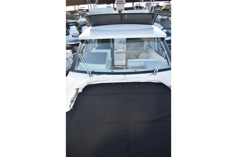  Yacht Photos Pics 2025 Regal 38 FXO boat with sleek design and spacious interior view.