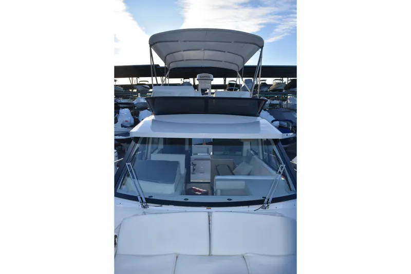  Yacht Photos Pics 2025 Regal 38 FXO yacht with spacious deck and modern design.