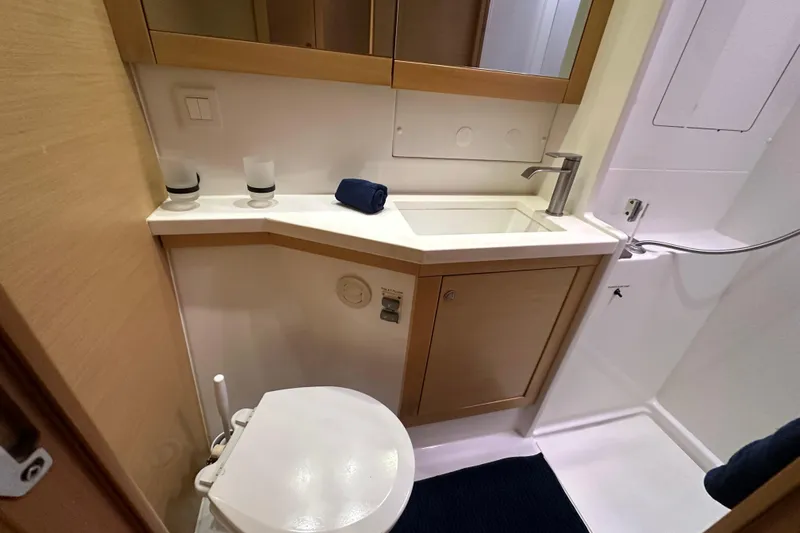 Callisto Yacht Photos Pics 2014 Lagoon 450 F yacht bathroom with modern fixtures and compact design.