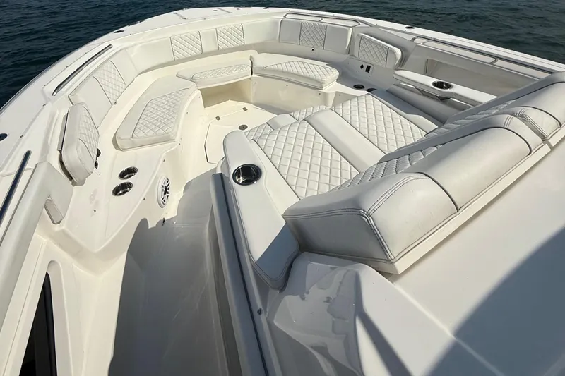 Oorah Yacht Photos Pics Luxurious seating on 2022 Pursuit S 378 Sport boat, featuring elegant white upholstery.