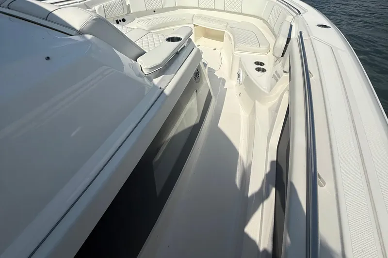 Oorah Yacht Photos Pics 2022 Pursuit S 378 Sport boat deck with seating and cup holders.