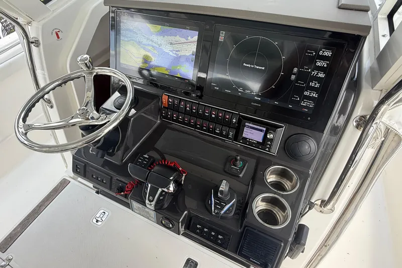 Oorah Yacht Photos Pics 2022 Pursuit S 378 Sport boat dashboard with advanced navigation and control systems.