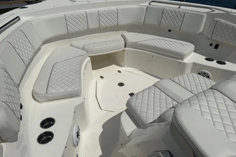 Oorah Yacht Photos Pics Luxurious seating area on 2022 Pursuit S 378 Sport boat with quilted upholstery.