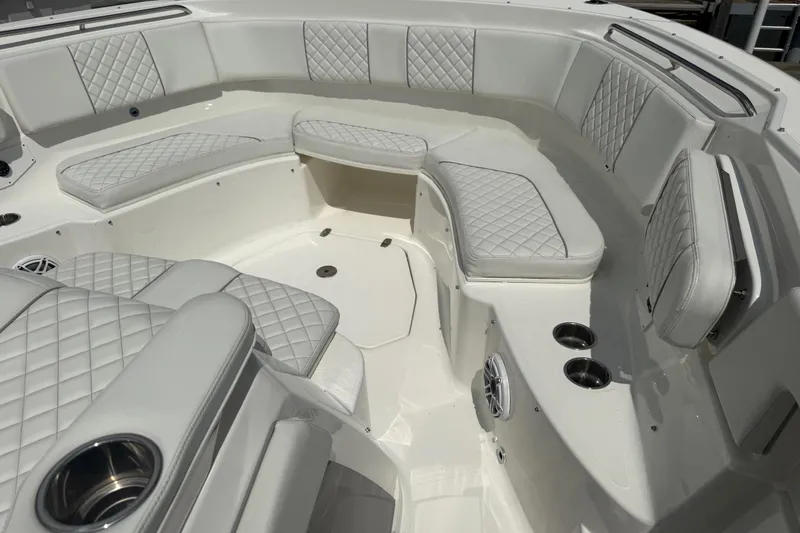 Oorah Yacht Photos Pics Luxurious seating area on 2022 Pursuit S 378 Sport boat with quilted upholstery.