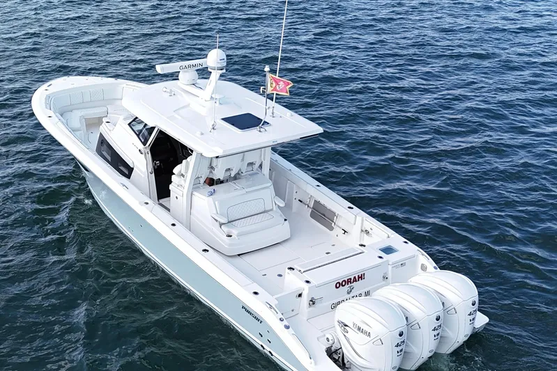 Oorah Yacht Photos Pics 2022 Pursuit S 378 Sport boat on open water, featuring triple Yamaha engines.