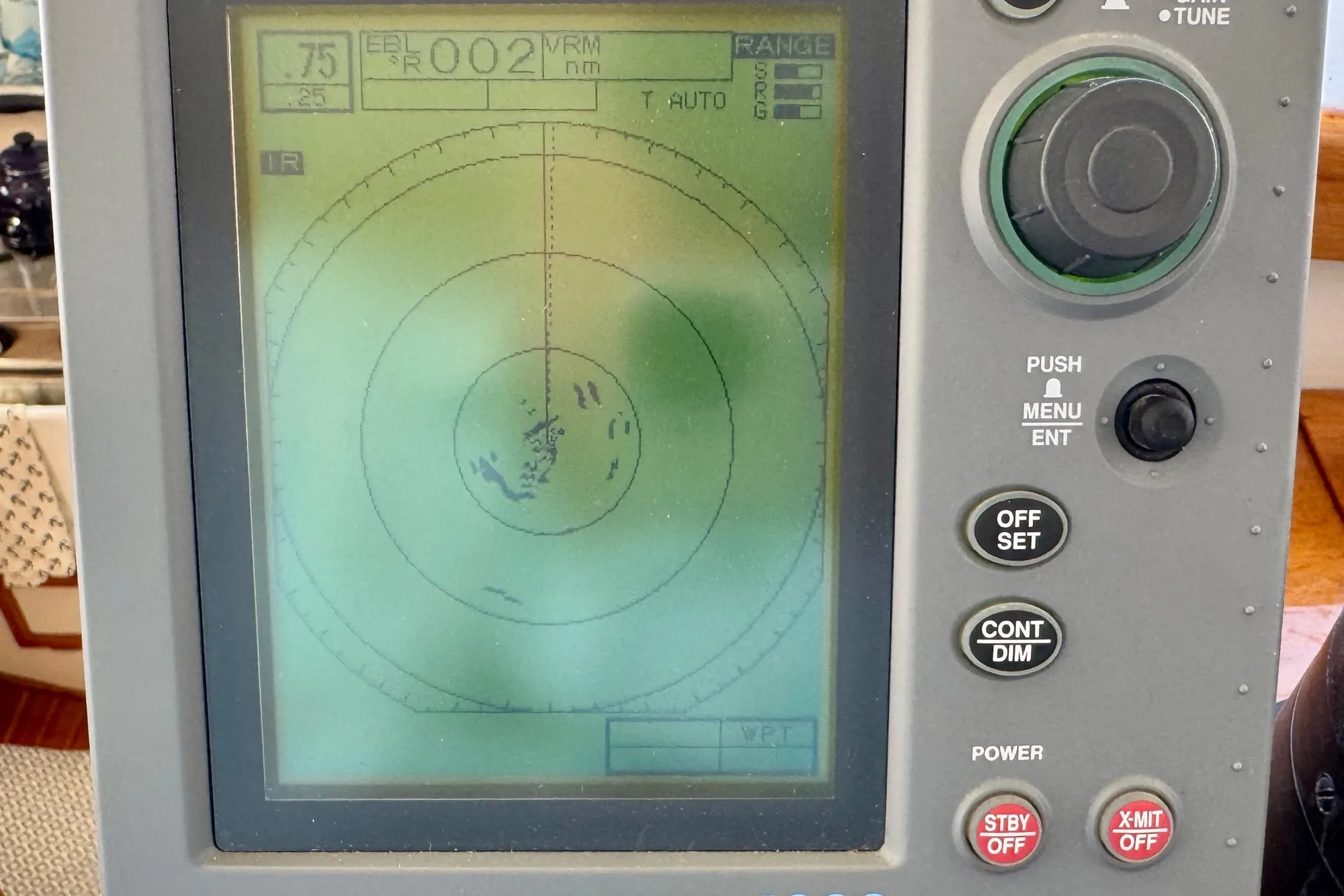 Radar display on a 1982 Jarvis Newman Flybridge Cruiser showing navigation data.