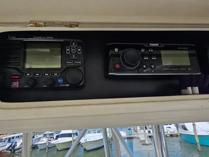  Yacht Photos Pics Marine electronics on a 1999 Ocean Yachts 48 Super Sport at a marina.