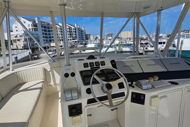  Yacht Photos Pics Helm of 1999 Ocean Yachts 48 Super Sport with Garmin navigation, docked at marina.