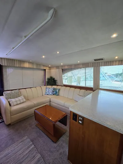  Yacht Photos Pics Luxurious interior of 1999 Ocean Yachts 48 Super Sport with plush seating and elegant decor.