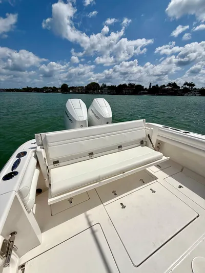 La Nata 3 Yacht Photos Pics 2015 Intrepid 375 Center Console boat with dual engines on a sunny day.