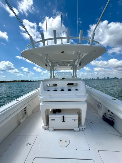 La Nata 3 Yacht Photos Pics 2015 Intrepid 375 Center Console boat on open water under blue sky.