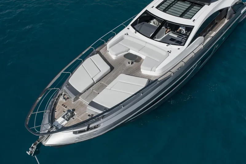 Never Give Up Yacht Photos Pics Azimut S8 2021 luxury yacht with spacious deck and sleek design on blue water.