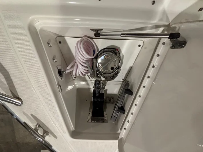  Yacht Photos Pics 2018 Formula 430 Super Sport Crossover anchor compartment with coiled rope and winch.