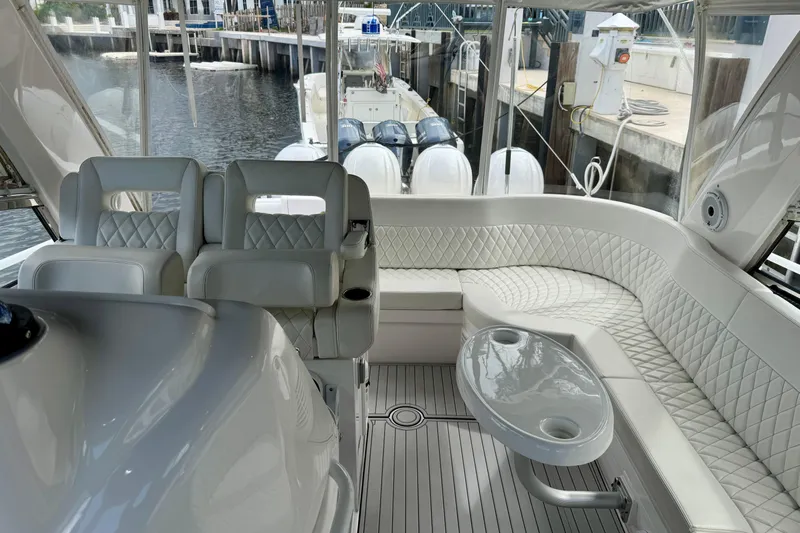 Tekeze Yacht Photos Pics Luxurious interior of 2019 Intrepid 475 Sport Yacht with plush seating and sleek design.