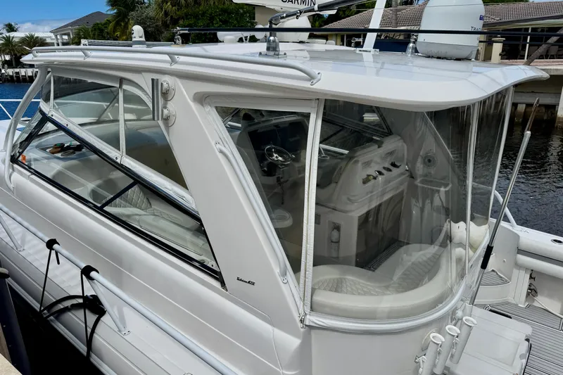 Tekeze Yacht Photos Pics 2019 Intrepid 475 Sport Yacht with sleek design, docked by the waterfront.