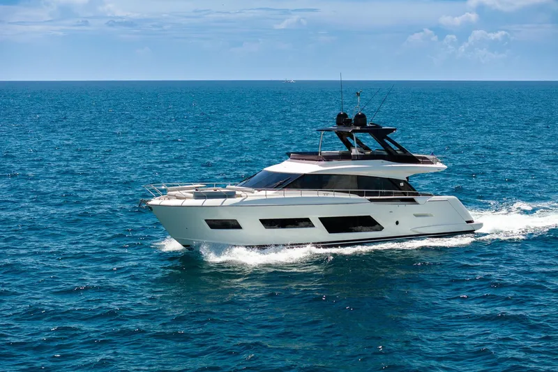  Yacht Photos Pics Luxurious 2022 Ferretti Yachts 670 cruising on open blue sea.