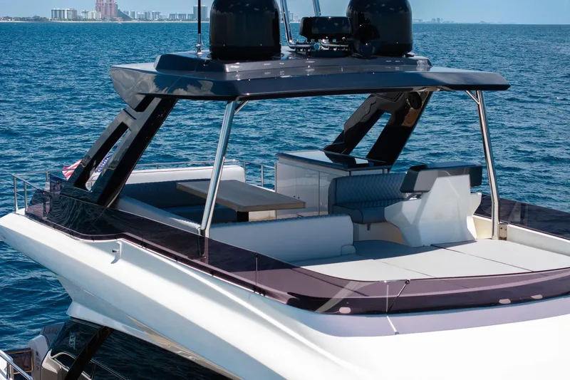  Yacht Photos Pics Luxury 2022 Ferretti Yachts 670 on open sea, showcasing sleek design and spacious deck.