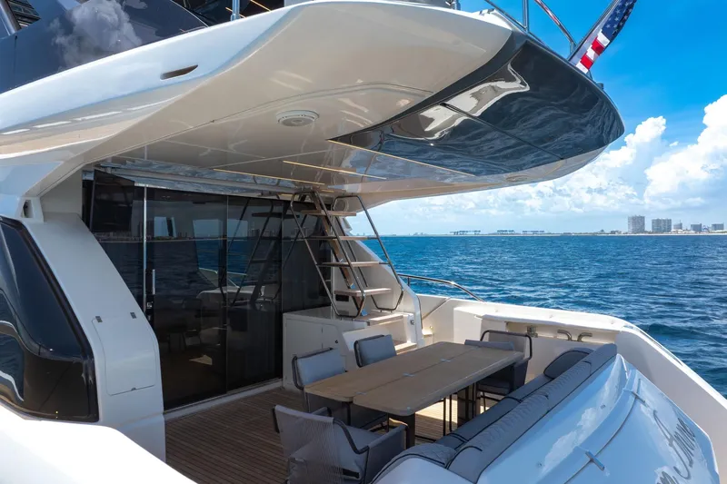  Yacht Photos Pics 2022 Ferretti Yachts 670, luxury deck view, ocean backdrop, modern design.