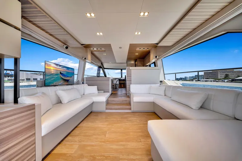  Yacht Photos Pics Luxurious interior of 2022 Ferretti Yachts 670 with modern design and panoramic windows.