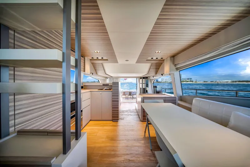  Yacht Photos Pics Luxurious interior of 2022 Ferretti Yachts 670 with modern design and ocean view.