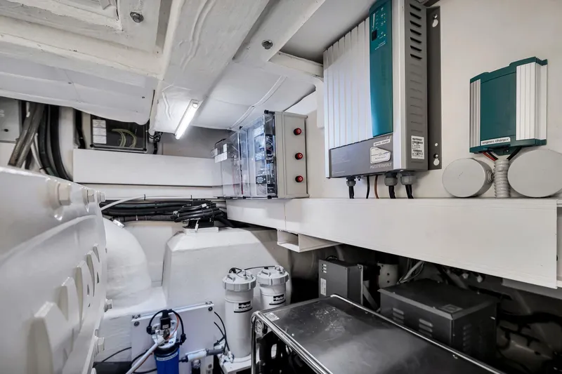  Yacht Photos Pics Engine room of 2022 Ferretti Yachts 670, showcasing electrical systems and components.