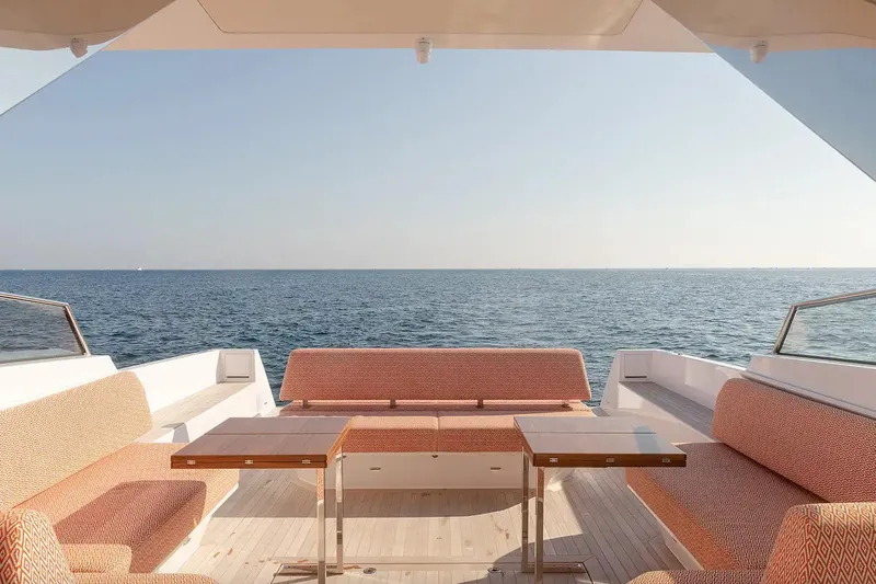  Yacht Photos Pics 2024 Delta Powerboats 60 Open yacht with elegant seating, overlooking the ocean.