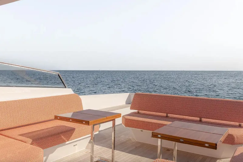  Yacht Photos Pics 2024 Delta Powerboats 60 Open yacht deck with ocean view and seating area.