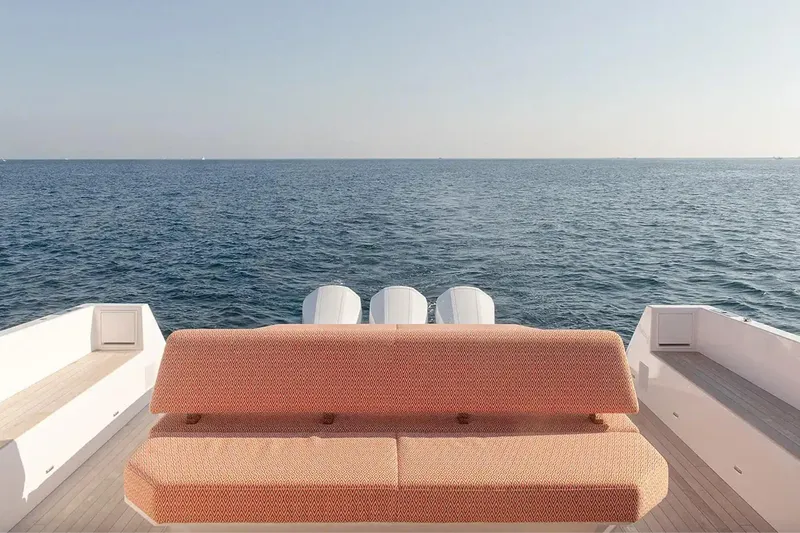  Yacht Photos Pics 2024 Delta Powerboats 60 Open, rear view with ocean backdrop and stylish seating.