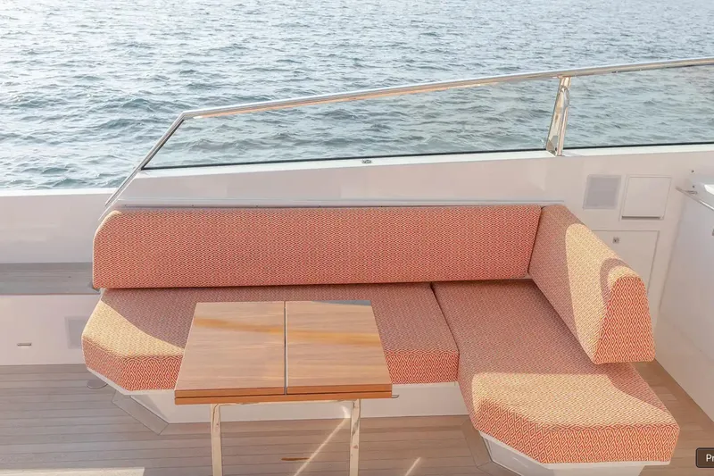  Yacht Photos Pics 2024 Delta Powerboats 60 Open yacht with stylish outdoor seating and ocean view.