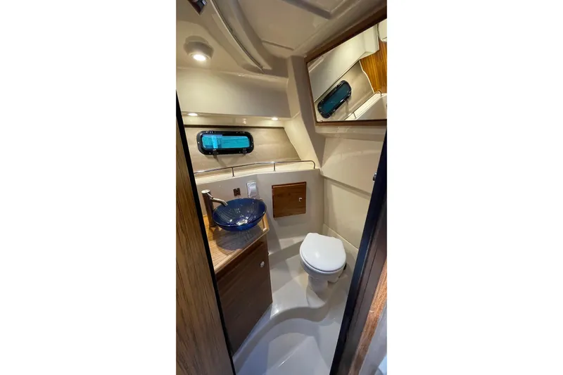  Yacht Photos Pics Luxurious bathroom interior of 2025 Ranger Tugs R-27 Seakeeper Ride boat.