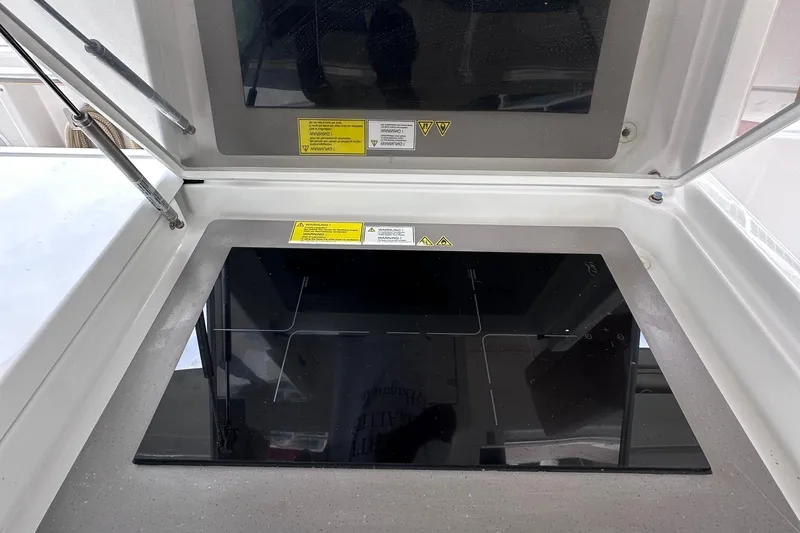 M2o Yacht Photos Pics 2024 Fjord 53 XL yacht kitchen with sleek induction cooktop.