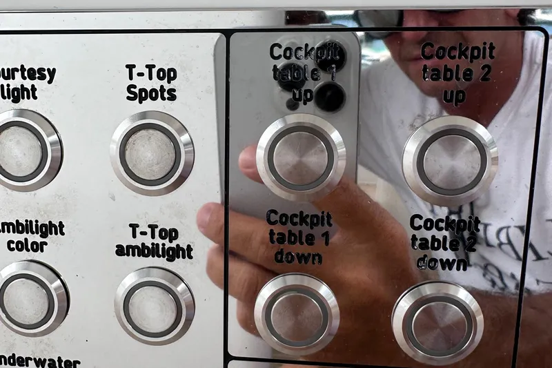 M2o Yacht Photos Pics Control panel with buttons for cockpit tables and lighting on a 2024 Fjord 53 XL yacht.