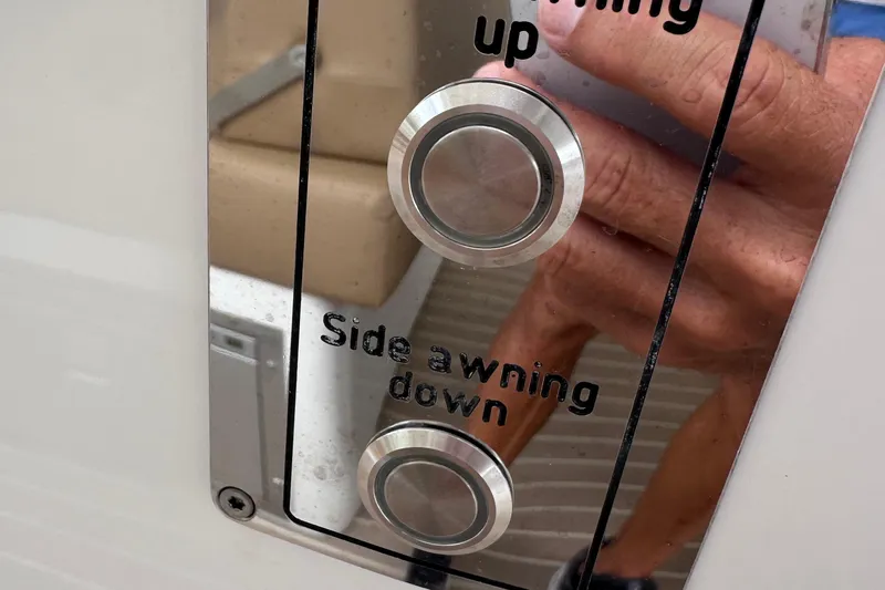 M2o Yacht Photos Pics Control panel with buttons for side awning on a 2024 Fjord 53 XL yacht.