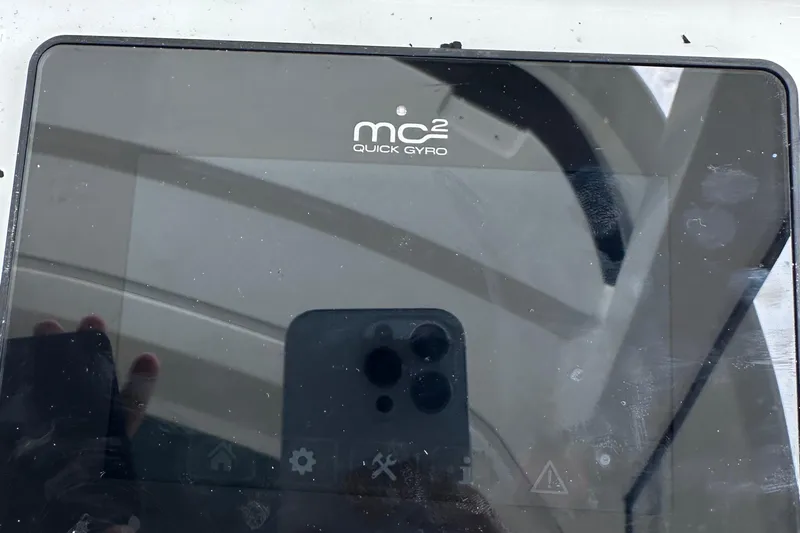 M2o Yacht Photos Pics MC&sup2; Quick Gyro display on 2024 Fjord 53 XL yacht, reflecting surroundings.