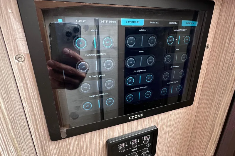 M2o Yacht Photos Pics Touchscreen control panel on 2024 Fjord 53 XL yacht, displaying various system settings.