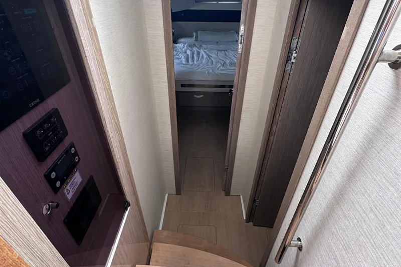 M2o Yacht Photos Pics Interior view of 2024 Fjord 53 XL yacht cabin with modern design and control panels.
