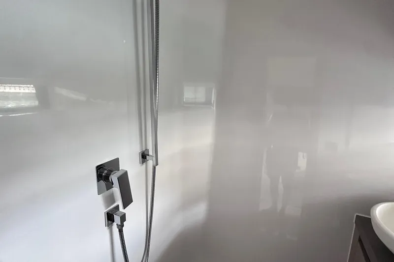 M2o Yacht Photos Pics Modern bathroom with sleek chrome fixtures in 2024 Fjord 53 XL yacht.