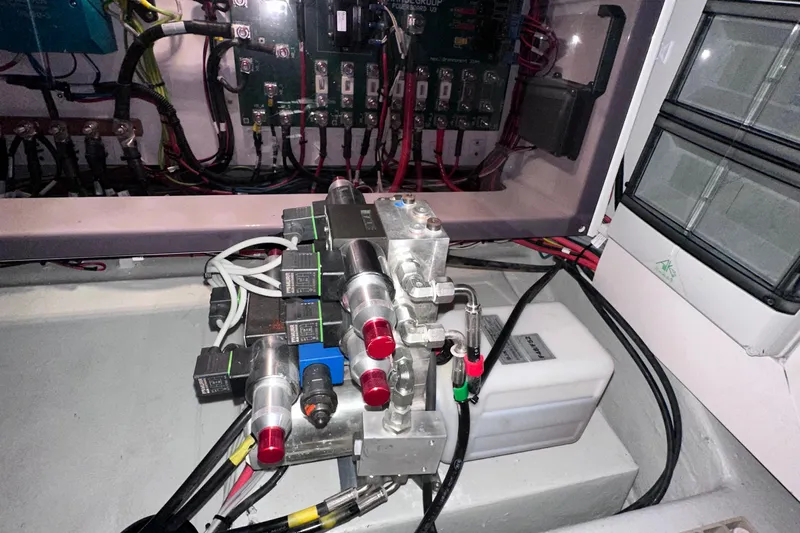 M2o Yacht Photos Pics 2024 Fjord 53 XL electrical system with wiring and components in a control panel.