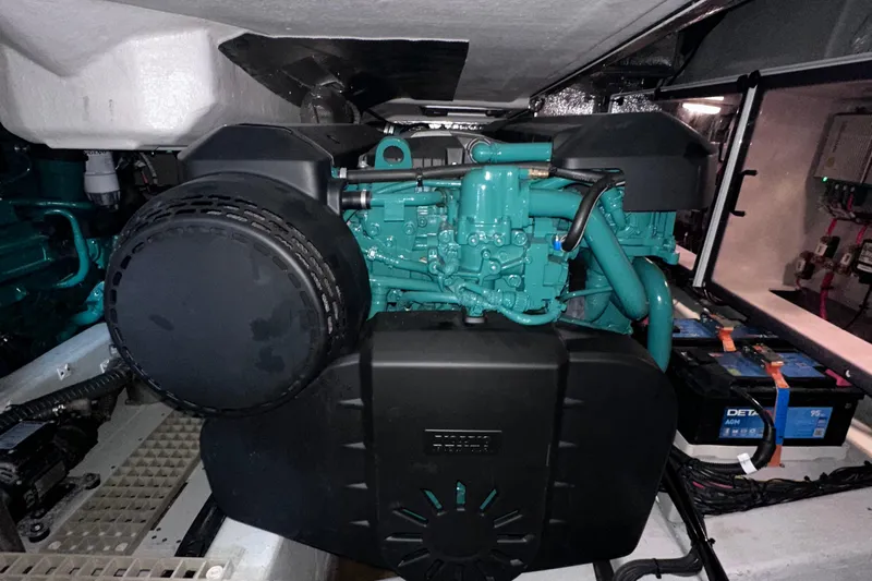 M2o Yacht Photos Pics Engine compartment of 2024 Fjord 53 XL yacht, showcasing modern marine engine and battery setup.